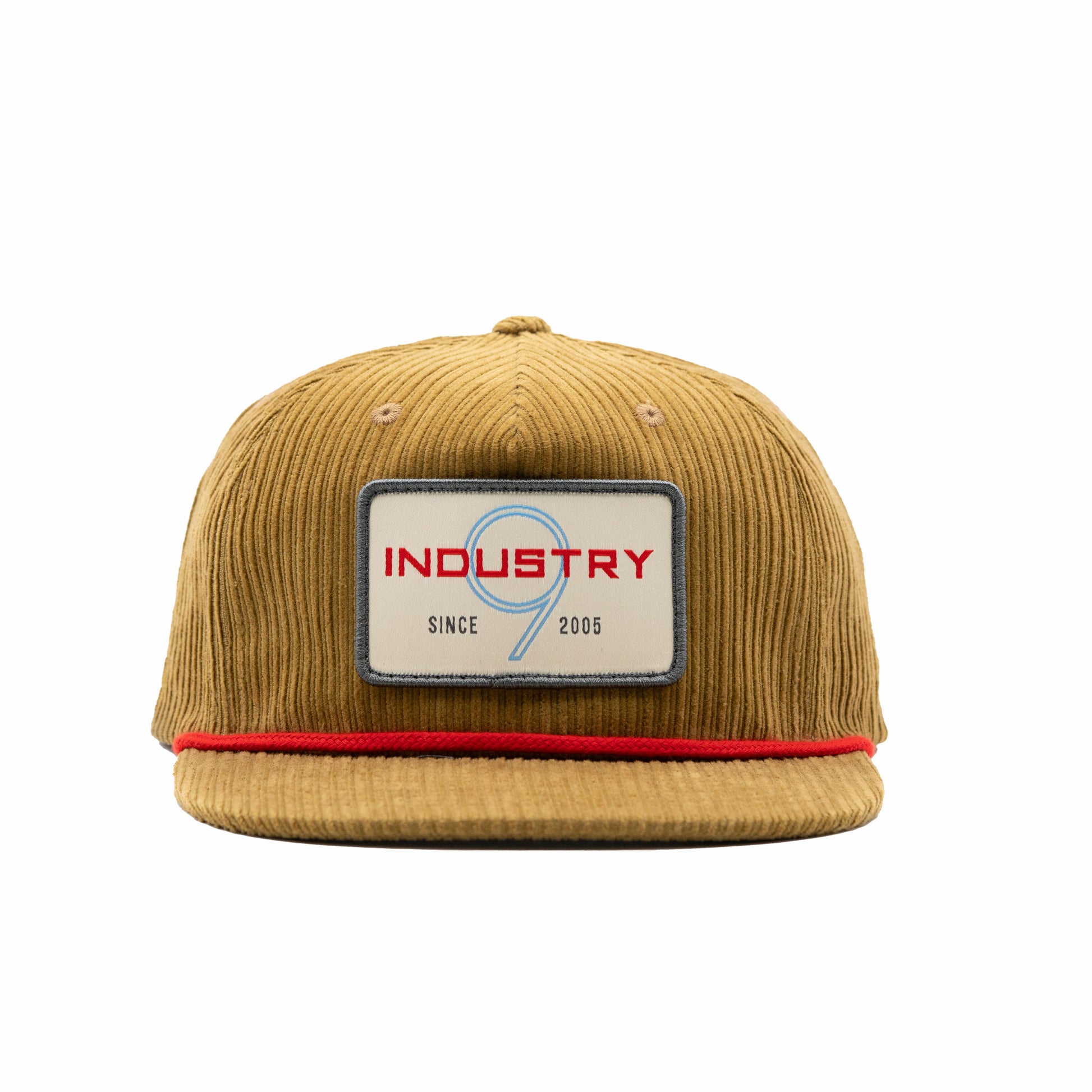 Brown corduroy cap with a patch featuring 'Industry 9' logo on a white background